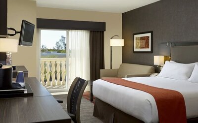 Day use room with balcony at Holiday Inn Express & Suites Naples Downtown - 5th Avenue.