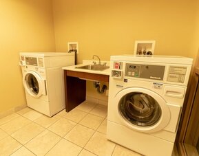 Laundry room at Kanata Kelowna And Conference Centre.