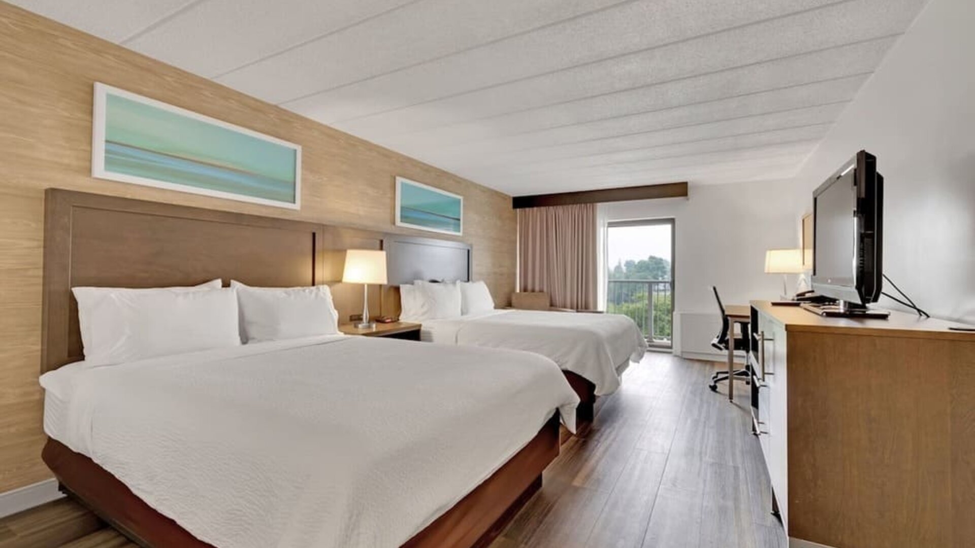 Bright and spacious day use twin room with work desk at Holiday Inn Peterborough-Waterfront.