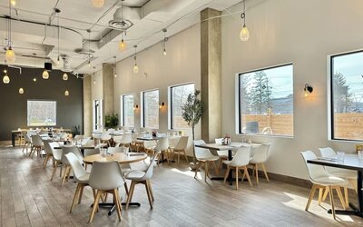 Stylish dining area perfect for co-working at Divya Sutra Plaza & Conference Centre.