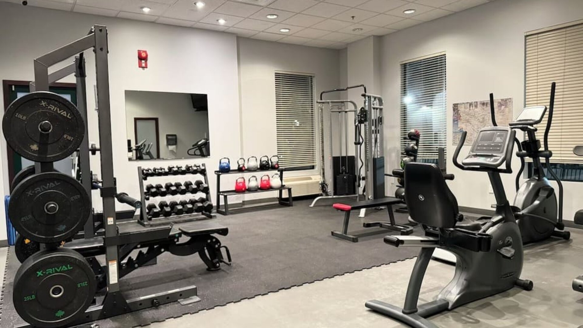 Fully equipped fitness center at Divya Sutra Plaza & Conference Centre.