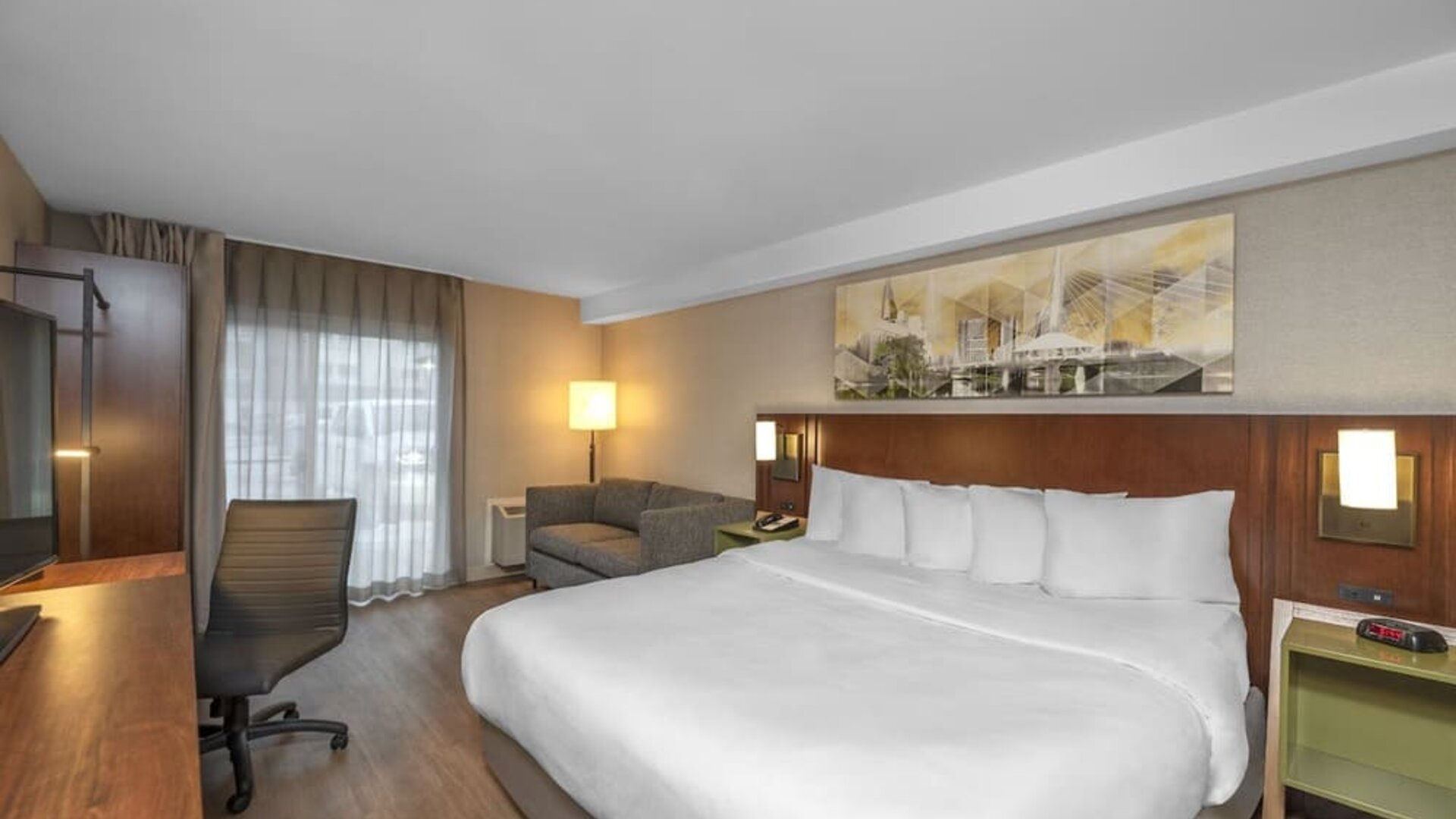 Bright and spacious day use room with work desk at Comfort Inn Sault Ste. Marie.