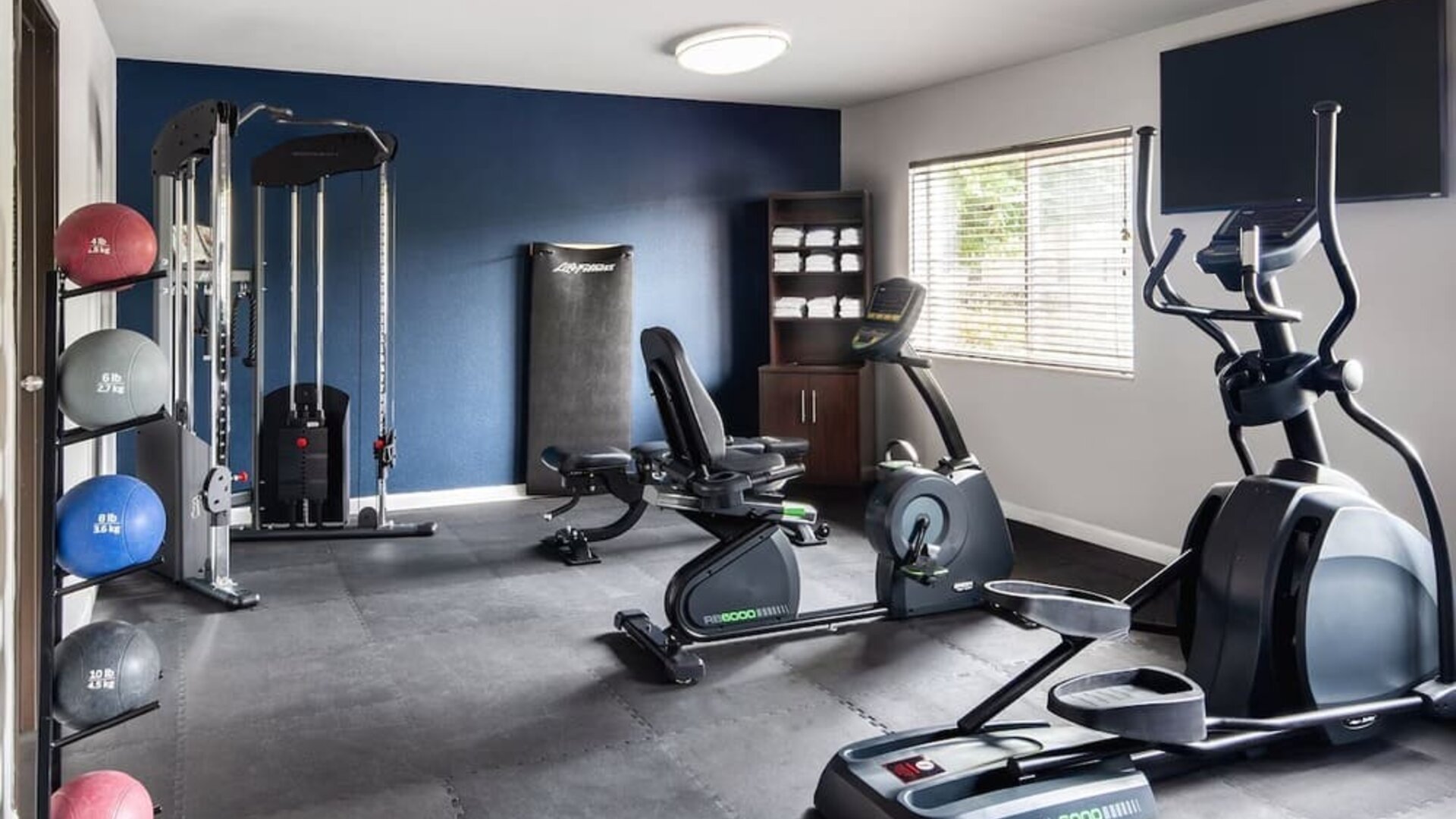 Fitness center available at Garner By IHG.