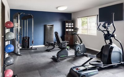 Fitness center available at Garner By IHG.