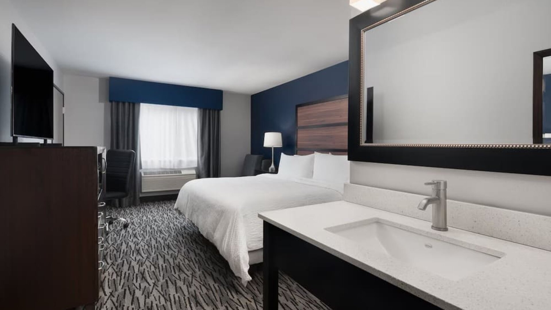 Day use room with work desk at Garner By IHG.