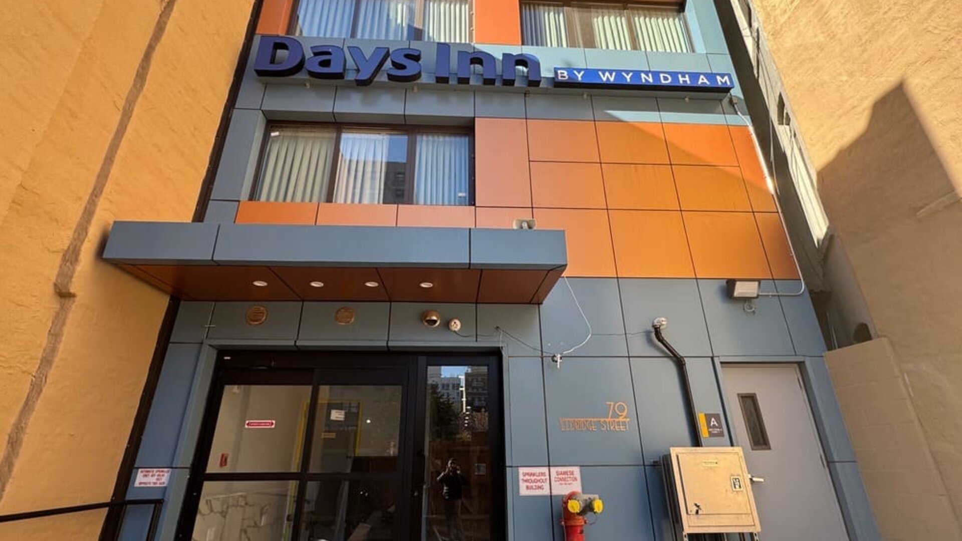 Hotel entrance at Days Inn Chinatown NYC.