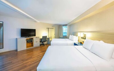 Brigth and spacious day use twin room with work desk at Comfort Inn Moncton Magnetic Hill.