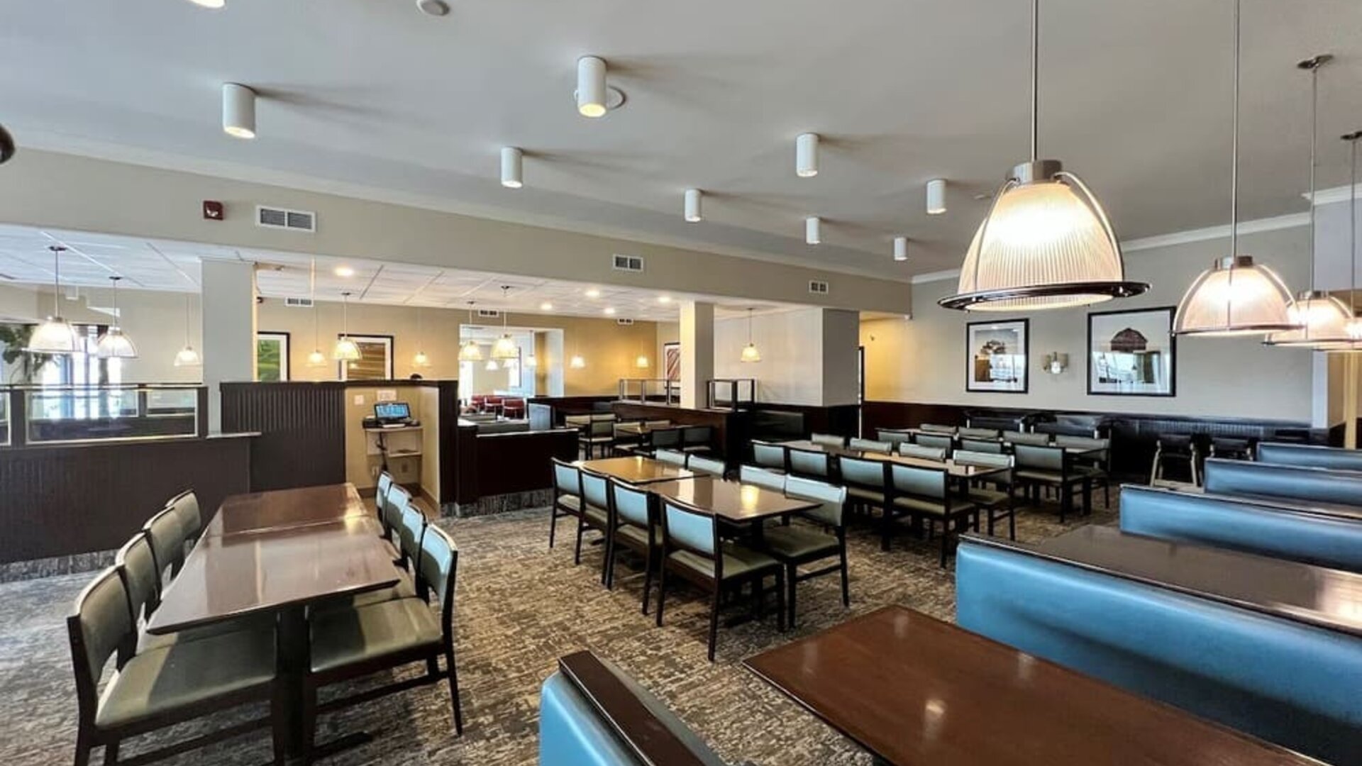 Dining area with comfortable seating at Holiday Inn Toronto Airport East.