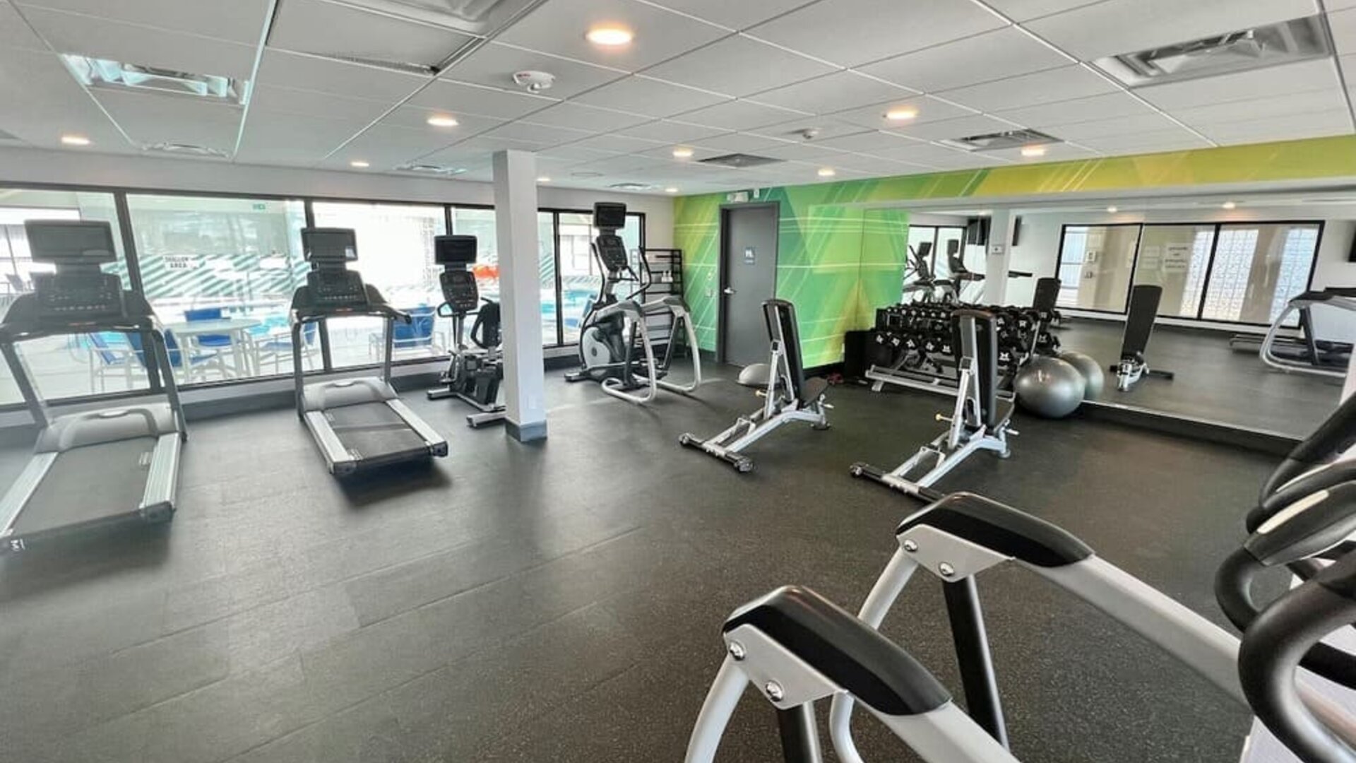 Fully equipped fitness center at Holiday Inn Toronto Airport East.