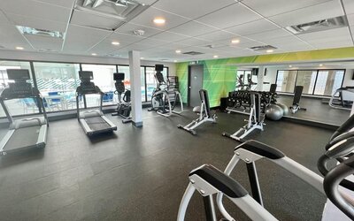Fully equipped fitness center at Holiday Inn Toronto Airport East.