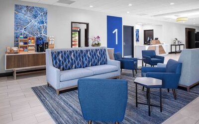 Lobby and coworking lounge at Holiday Inn Express & Suites Hermosa Beach.