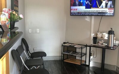 Coffee service in the lobby of Summit Inn Near Houston Medical Center-NRG Park.