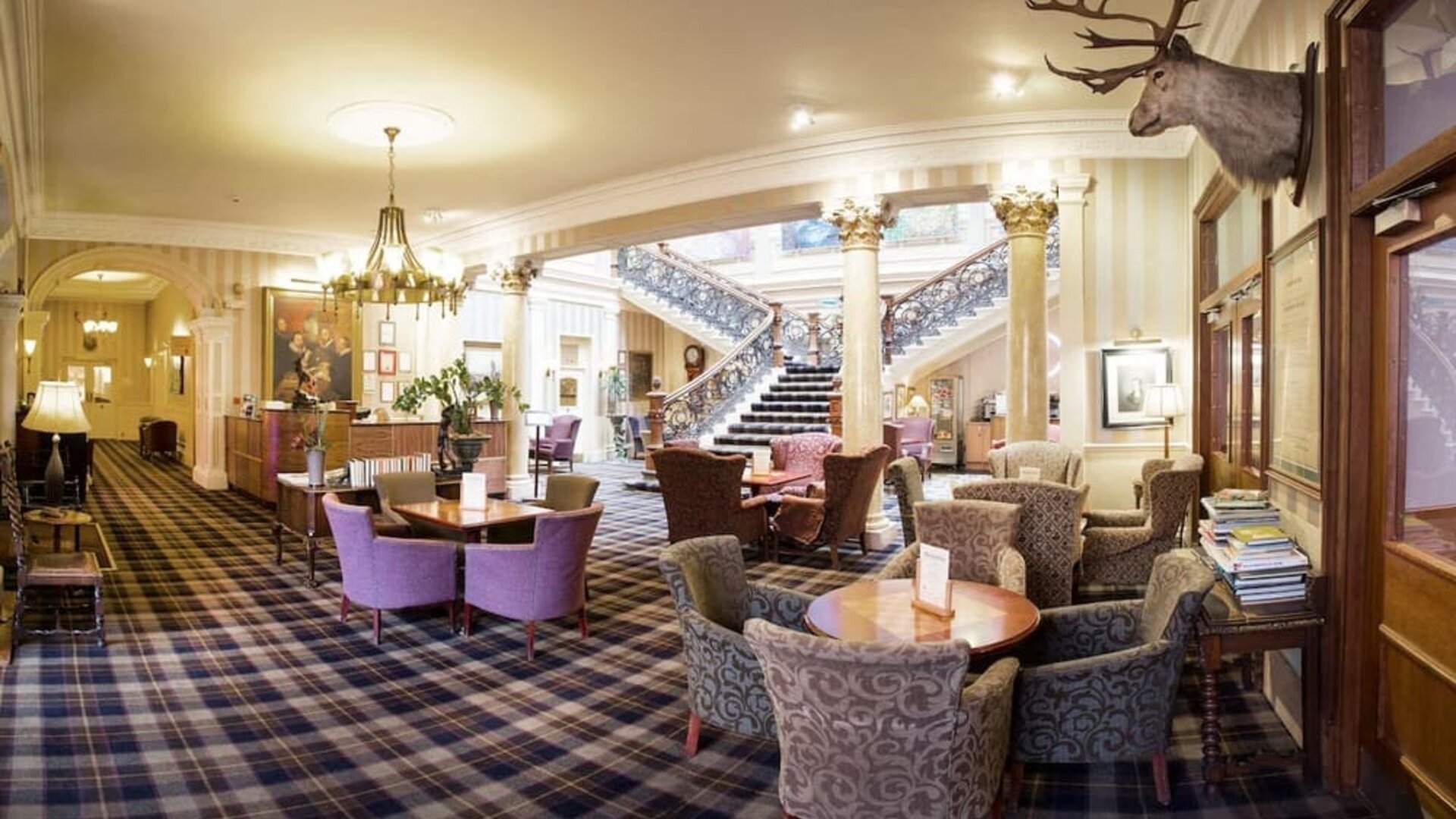 The Royal Highland Hotel’s lobby lounge has armchairs and coffee tables, perfect for co-working.