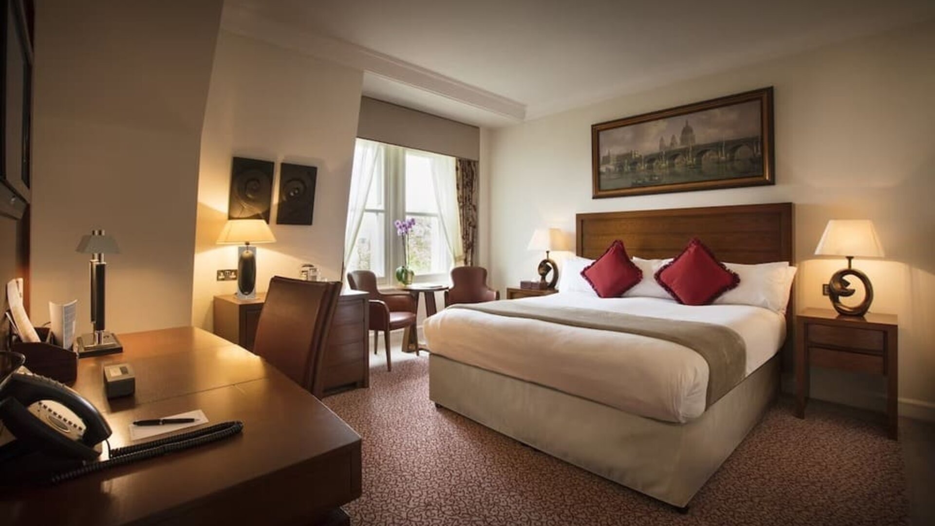 Day use room with work desk and lounge sitting at The Royal Horseguards Hotel.