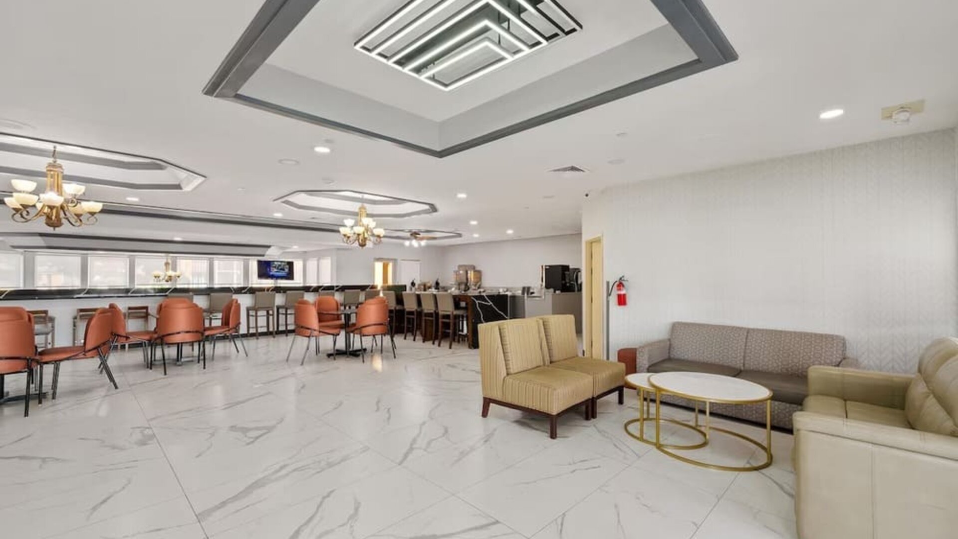 Lobby and coworking lounge at Chicago Club Inn & Suites.