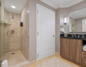 Guest bathroom with shower at The Atlantic Hotel & Spa.