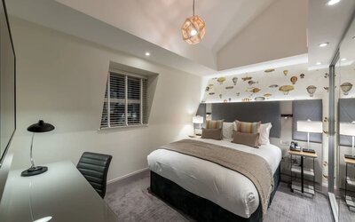 Day use room with TV screen and work desk at Mercure Hotel London Hyde Park.