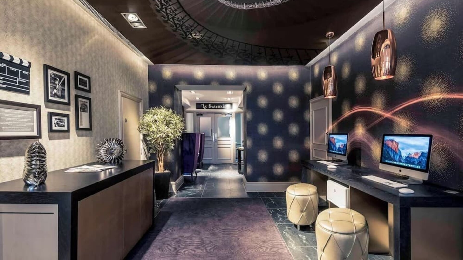 Business center with computers and printer at Mercure Hotel London Hyde Park.