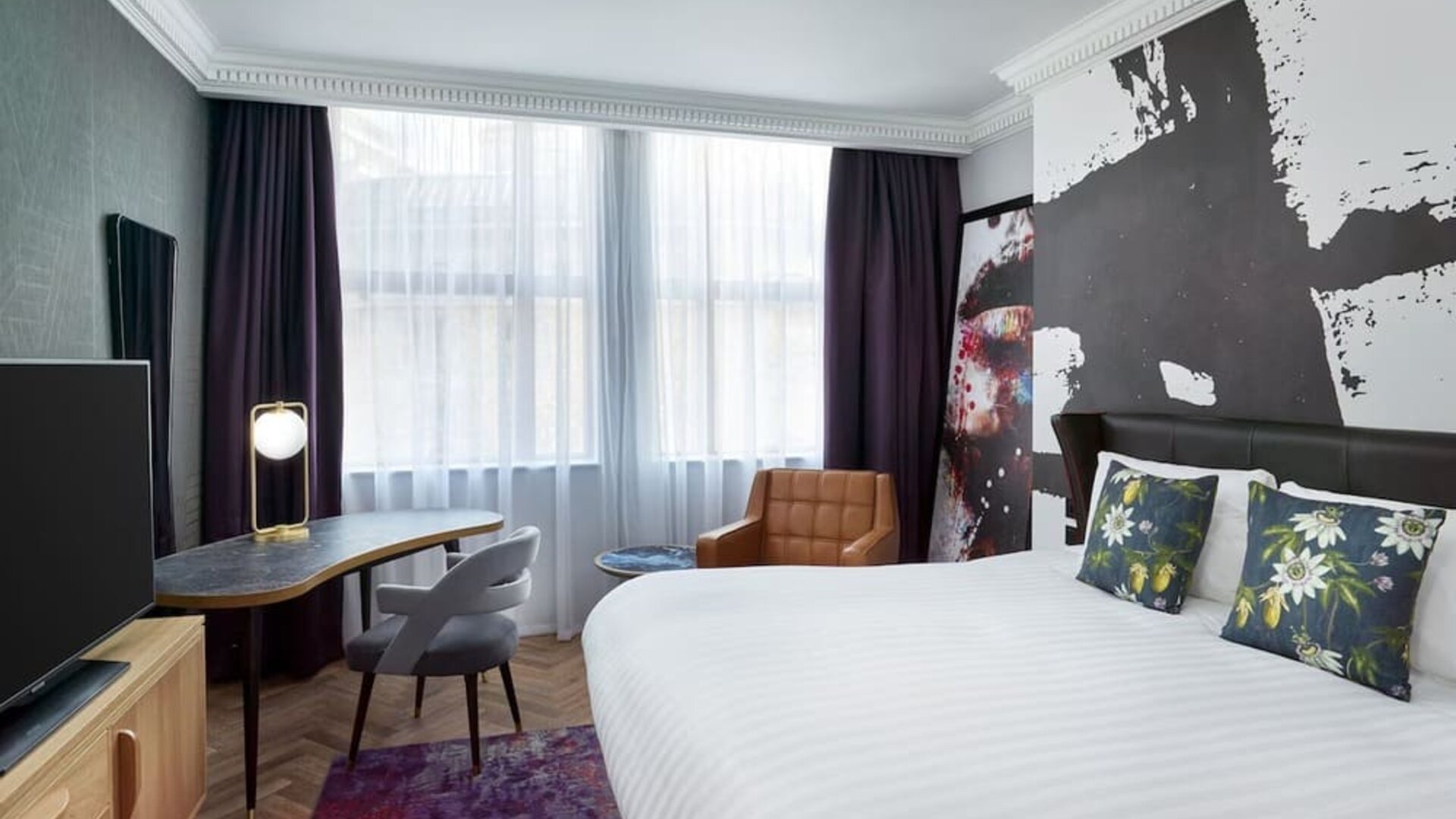 Bright and spacious king room with work desk at NYX Hotel London Holborn By Leonardo.