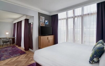 Day use studio suite with work desk and living area at NYX Hotel London Holborn By Leonardo.