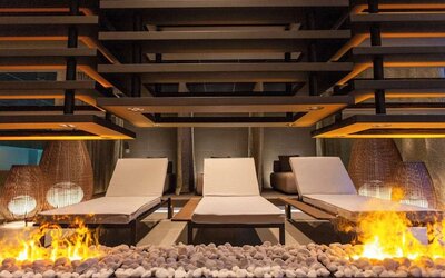 Lounge chairs and fire pit at Keight Hotel Opatija.