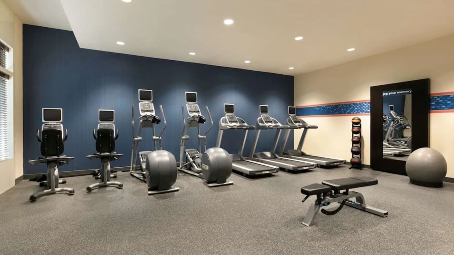 Fitness center at Hampton Inn New York - LaGuardia Airport.