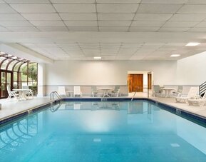 Indoor pool area at Hampton Inn New York - LaGuardia Airport.