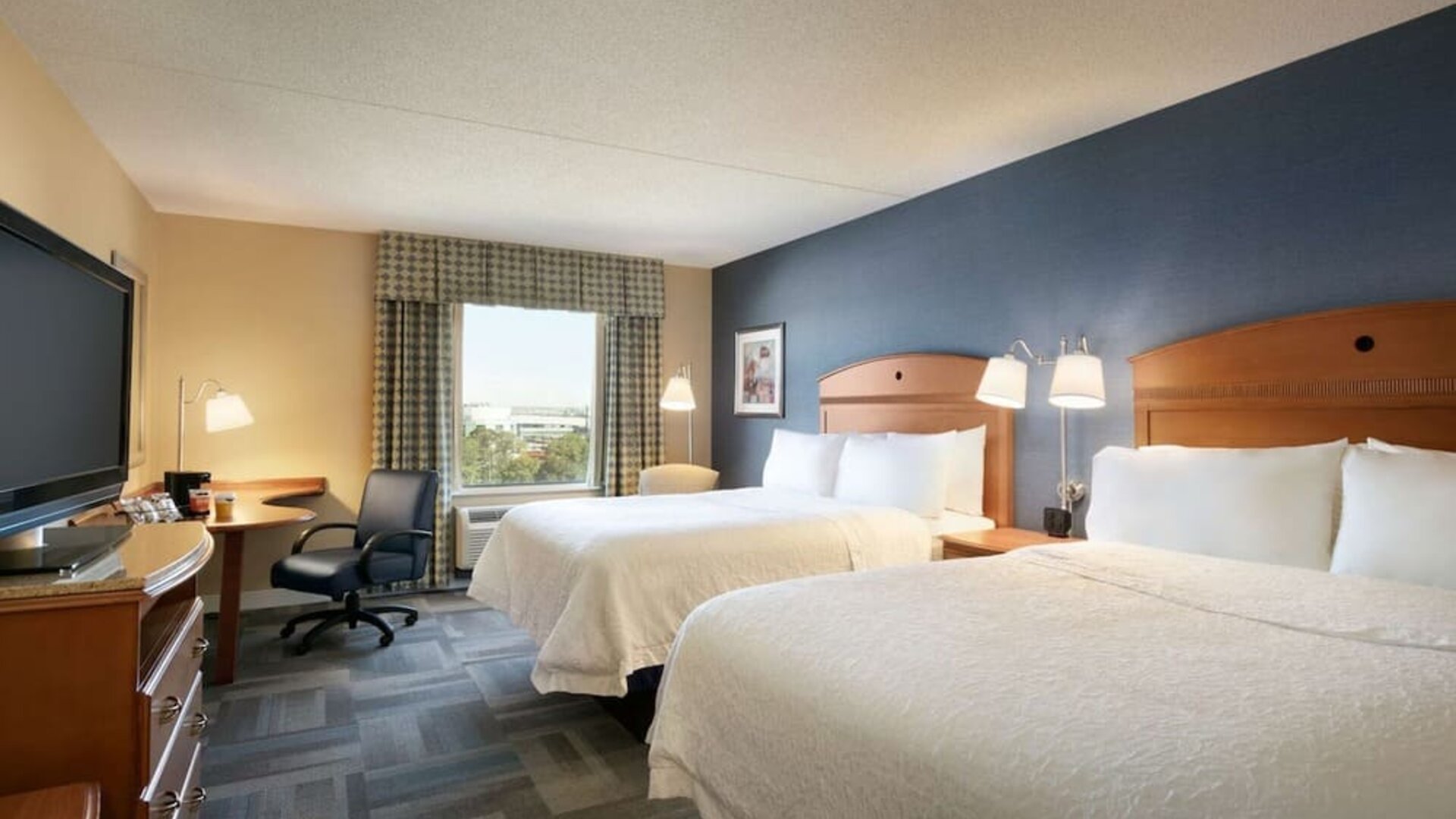 Queen beds at Hampton Inn New York - LaGuardia Airport.