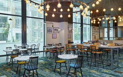 Dining area at Leonardo Royal Hotel London Tower Bridge.
