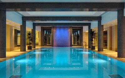 Relaxed interior heated pool at Leonardo Royal St Paul's Hotel.