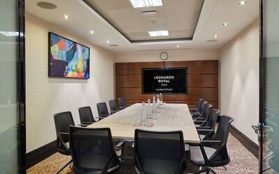 Professional meeting room with ergonomic chairs at Leonardo Royal St Paul's Hotel.