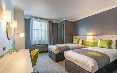 Day use twin room with work desk and large window at Thistle Express London, Luton.