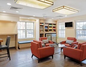 Coworking space and snack bar at MainStay Suites Mt. Laurel - Philadelphia.
