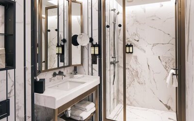 Guest bathroom with shower and free toiletries at Page8, Page Hotels.