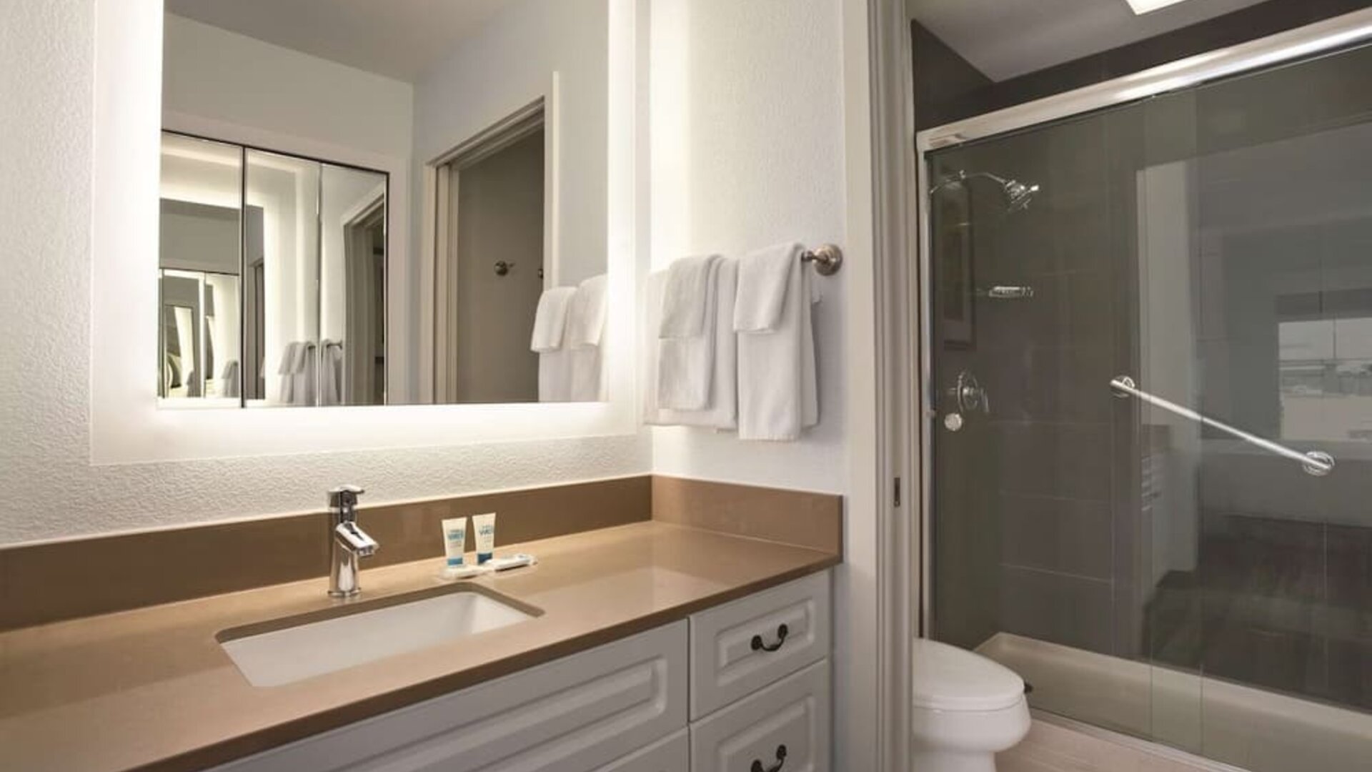 Guest bathroom with shower at Hyatt House Pleasant Hill.
