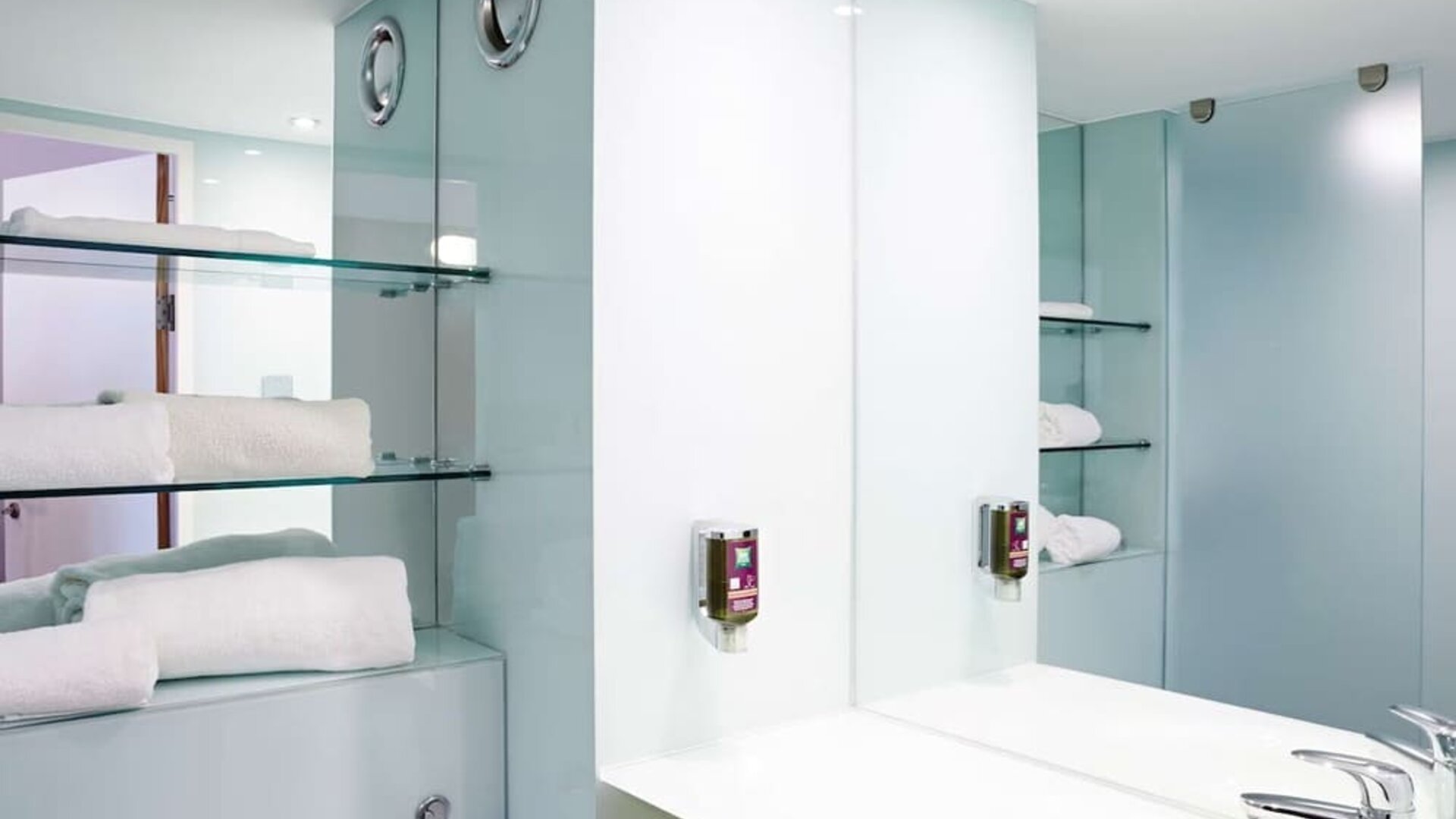 Guest bathroom with shower and free toiletries at Ibis Styles Barnsley.