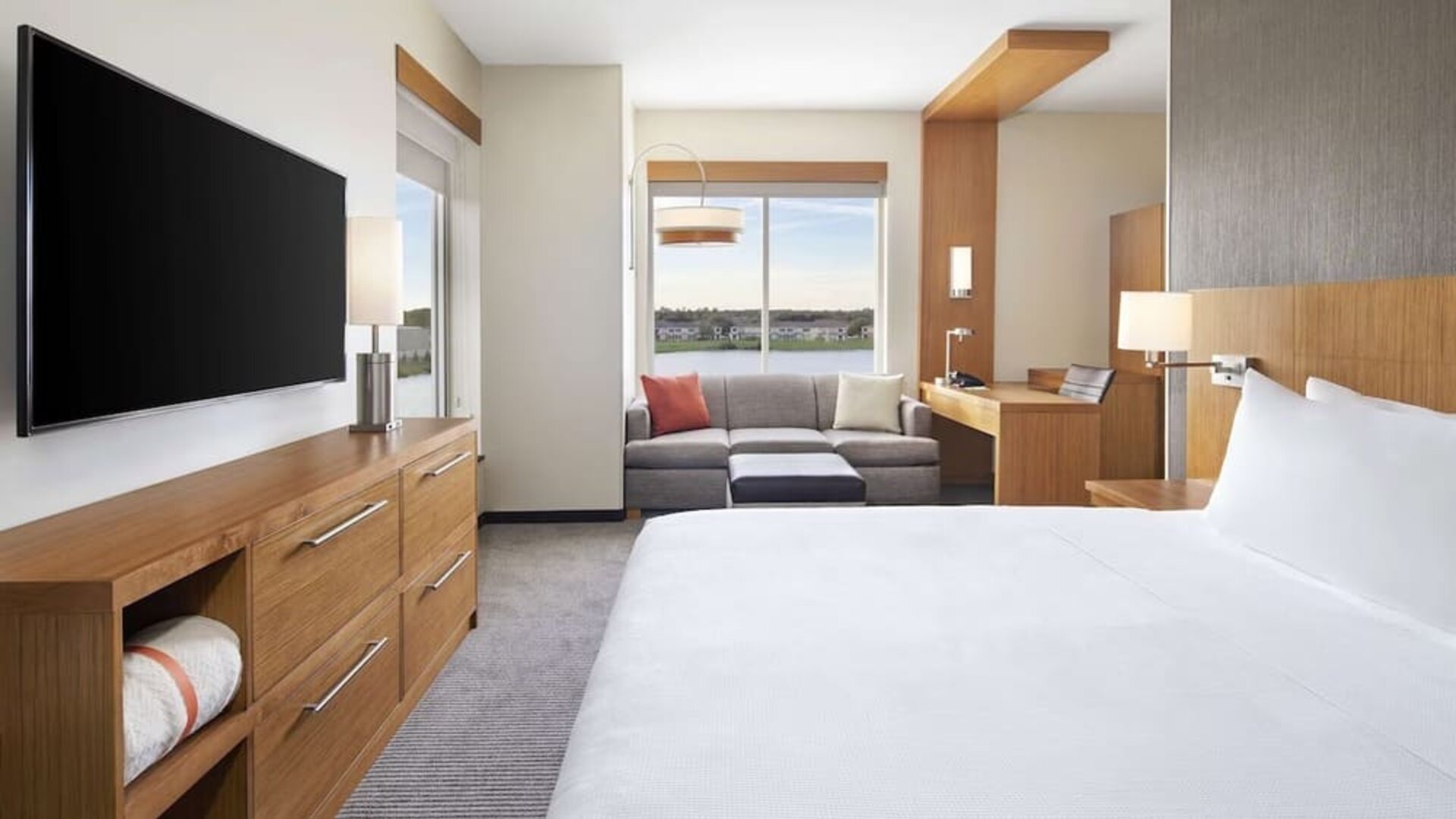 Day use room with sofa and work desk at Hyatt Place Jacksonville / St. Johns Town Center.
