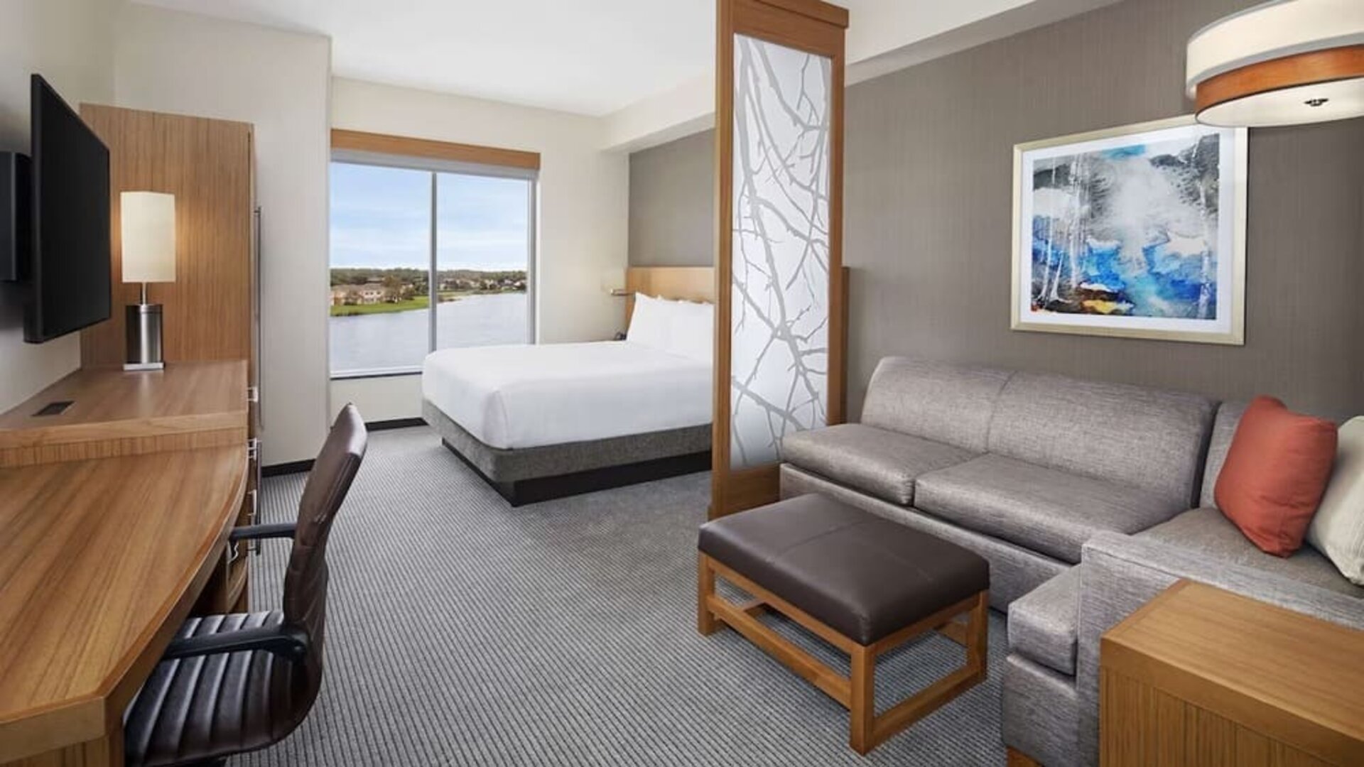 Day use room with sofa and work desk at Hyatt Place Jacksonville / St. Johns Town Center.