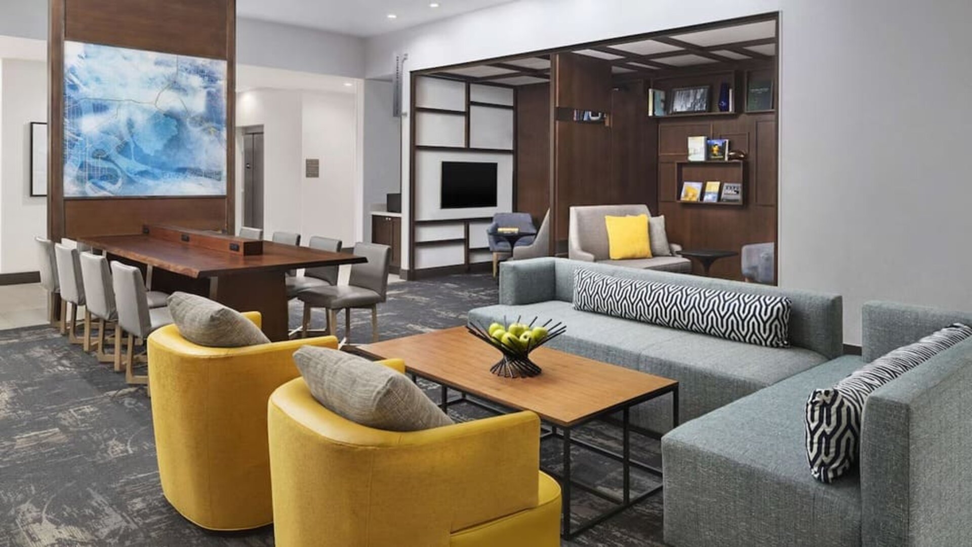 Lobby and coworking lounge at Hyatt Place Jacksonville / St. Johns Town Center.