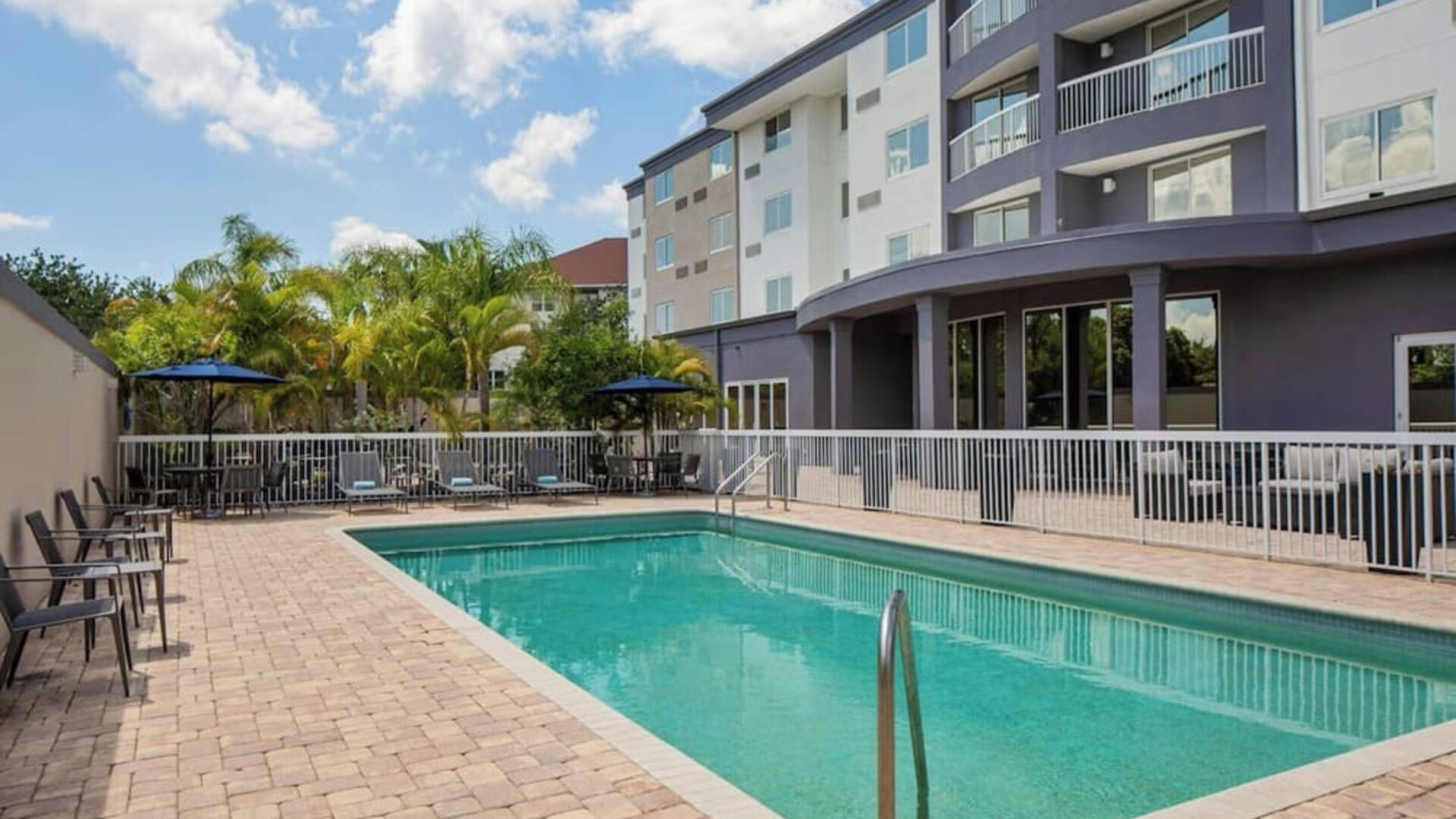 Refreshing outdoor pool at Courtyard By Marriott Tampa Oldsmar.