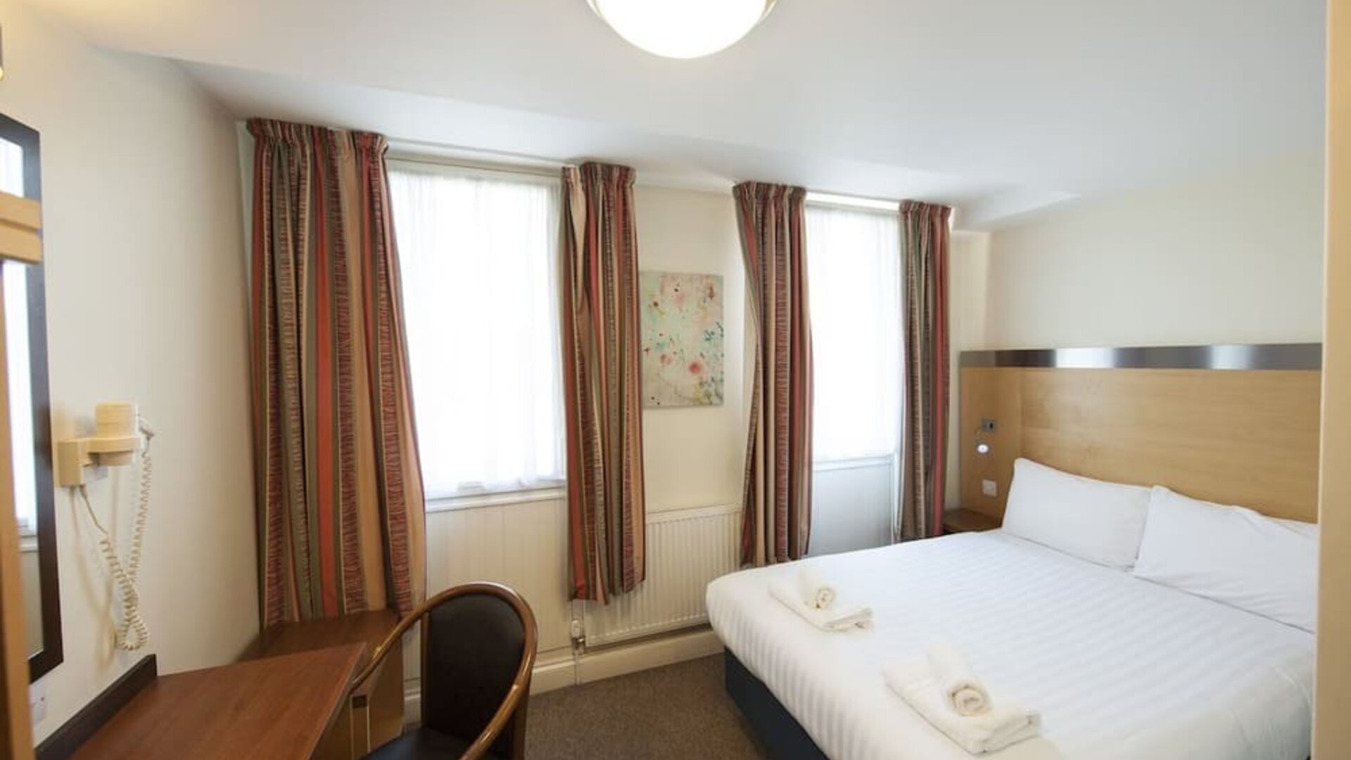 Day use room with work desk at Belgrave Oval London Hotel.