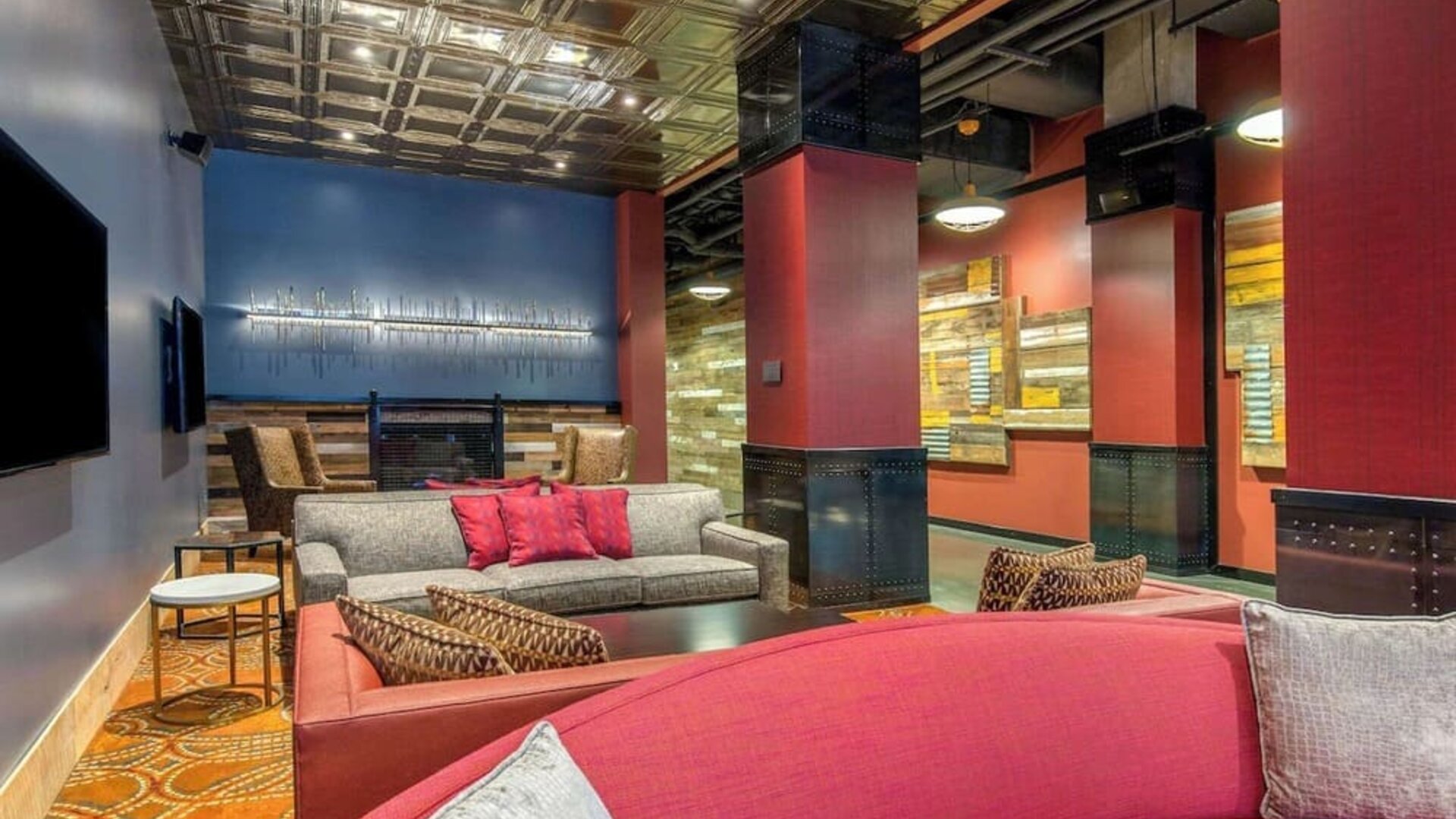 Lobby and coworking lounge at Cambria Hotel Nashville Downtown.