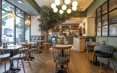 Dining area at Indigo London-Paddington Hotel.