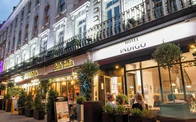 Outdoor seating area at Indigo London-Paddington Hotel.