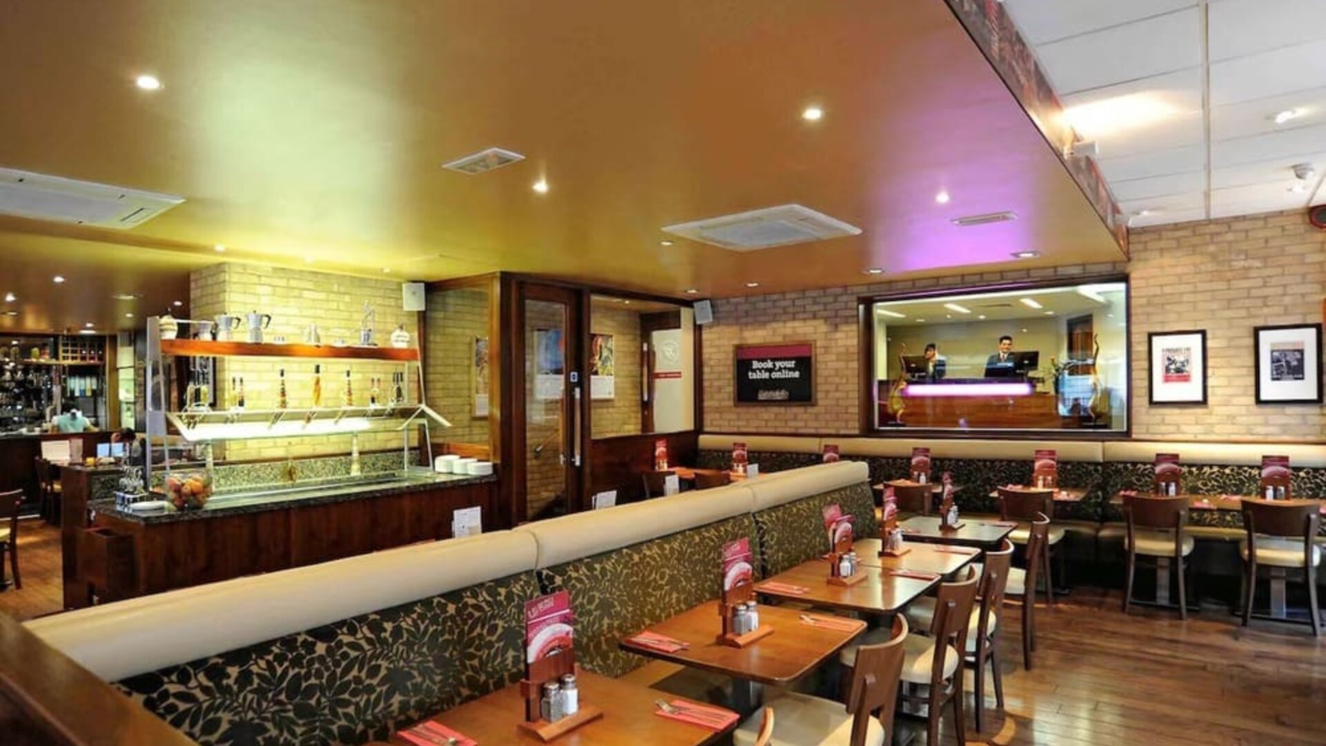 Dining area with comfortable seating at Mercure London Paddington Hotel.