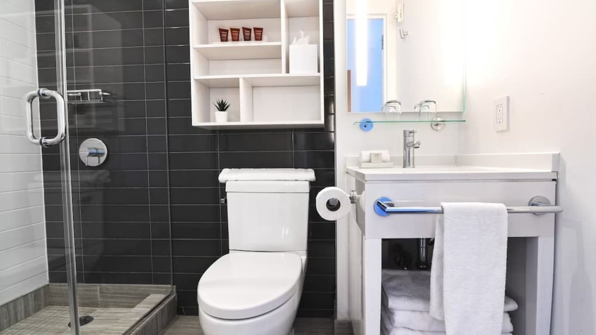 Guest bathroom with shower at Edge Hotel NYC.