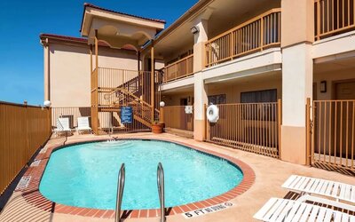 Refreshing outdoor pool at Days Inn By Wyndham San Antonio Northwest/Seaworld.