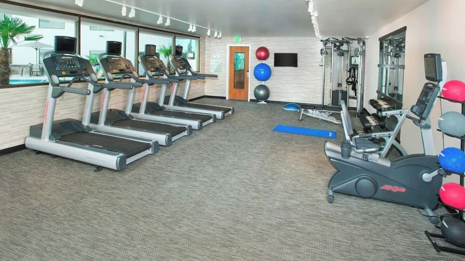 Fitness center available at Courtyard By Marriott Redwood City.