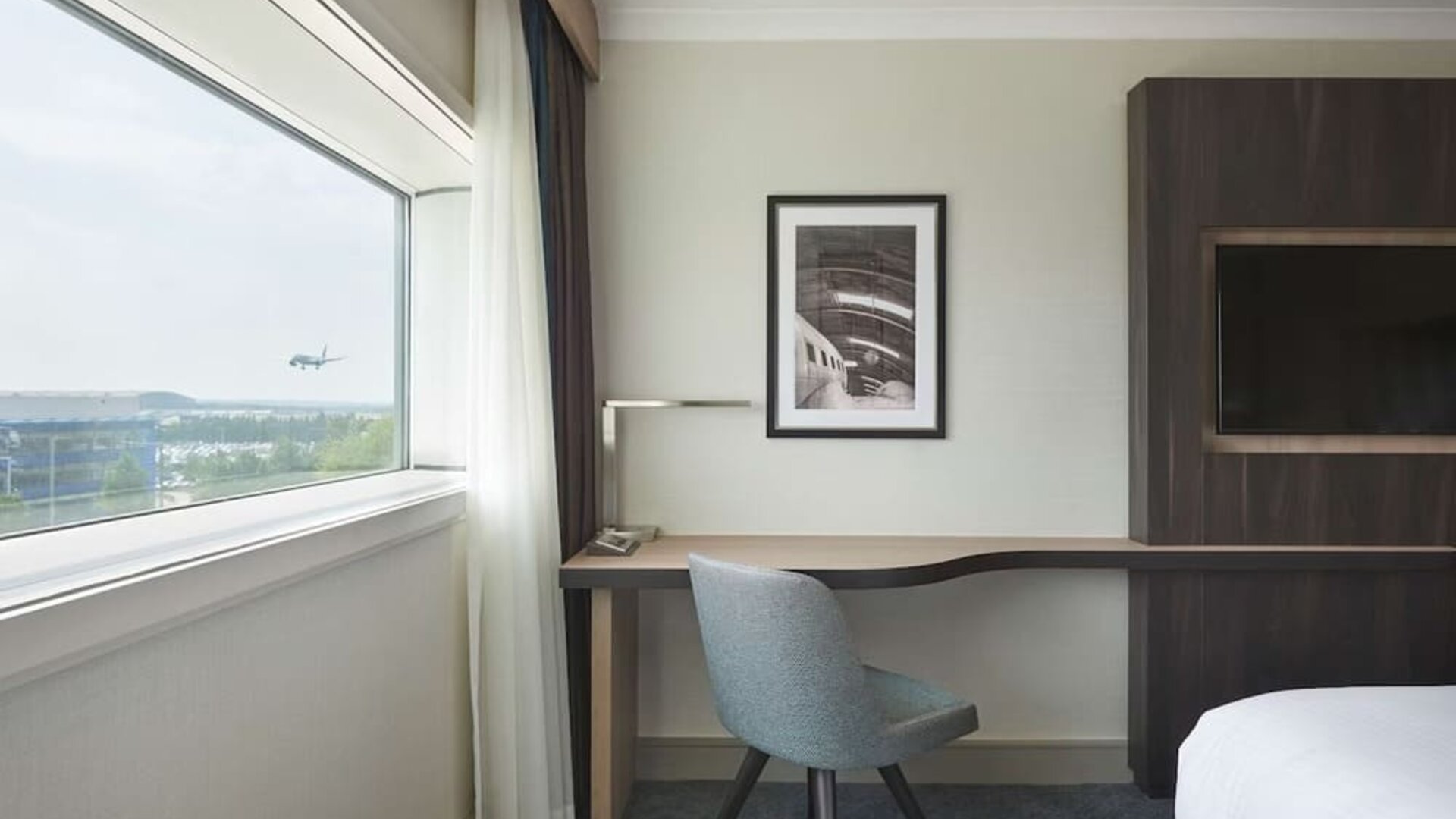 In-room workspace at Hyatt Place London Heathrow Airport.