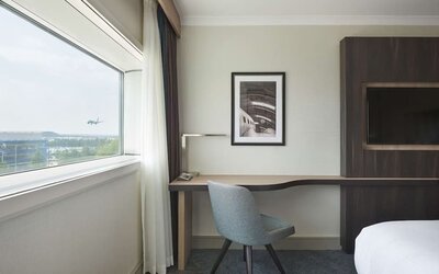 In-room workspace at Hyatt Place London Heathrow Airport.